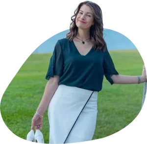 sarah rus standing outside with grass background