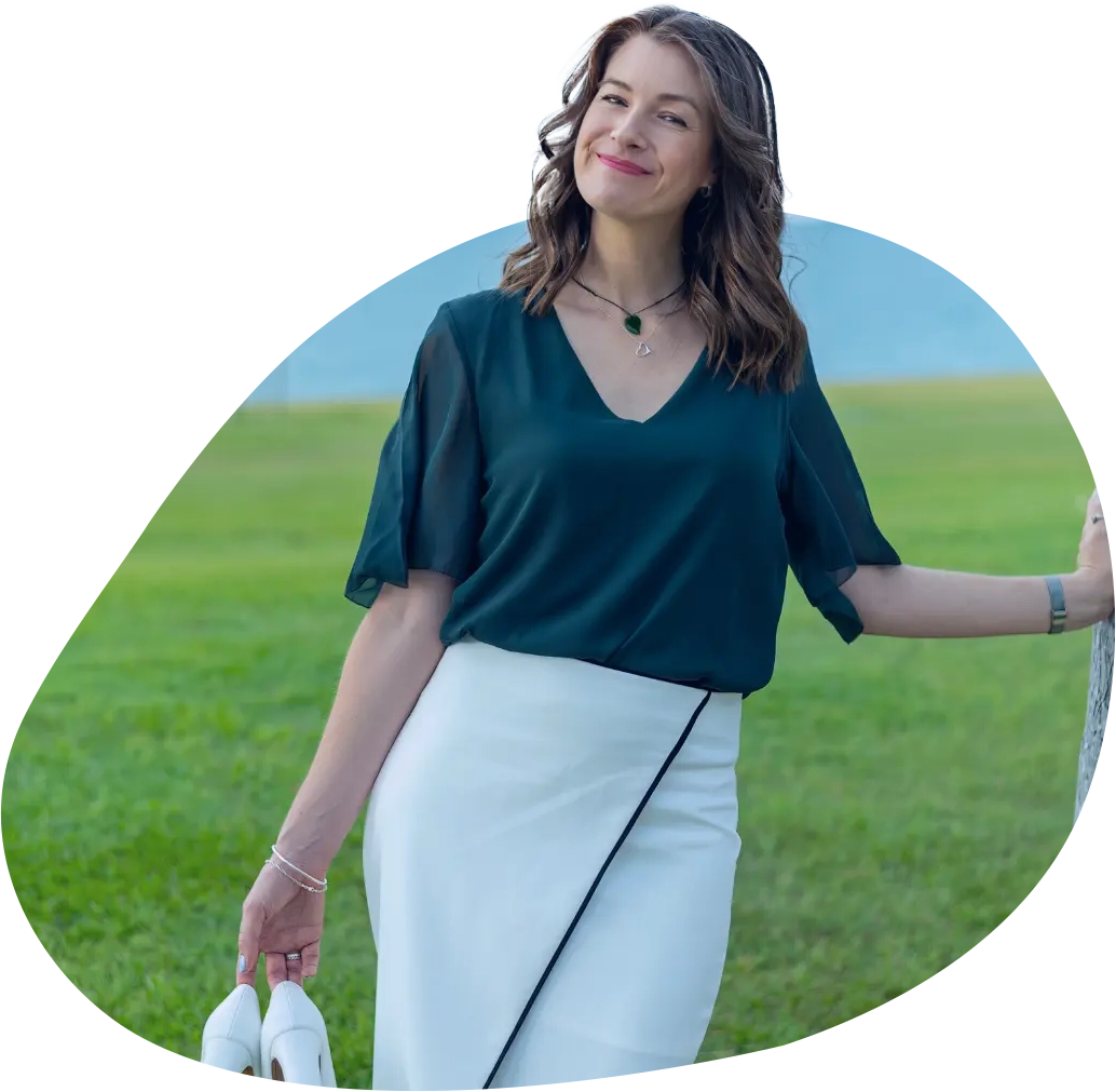 sarah rus standing outside with grass background